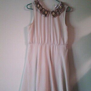 A shear dress with a suit jacket